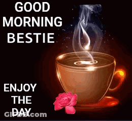 A Cup Of Hot Coffee With Smoke Coming Out Of It And A Rose On A Saucer . GIF