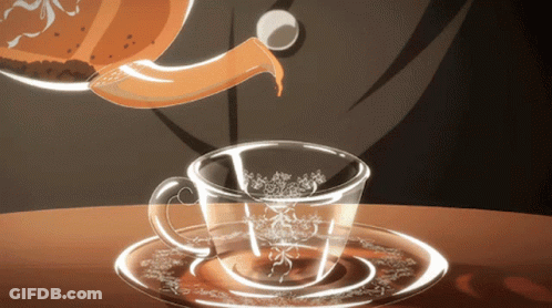 A Cup Of Tea Is Being Poured From A Teapot Into A Cup On A Saucer GIF