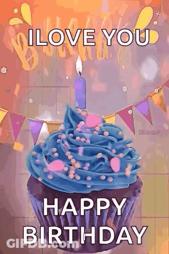 A Cupcake With Blue Frosting And A Candle On It Is Sitting On A Table . GIF