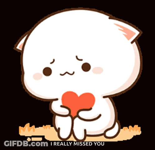 A Cute Cartoon Cat Is Holding A Red Heart And Says I Really Missed You GIF