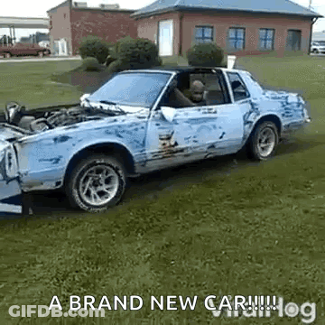 A Damaged Car Is Parked In A Grassy Field With The Words A Brand New Car GIF