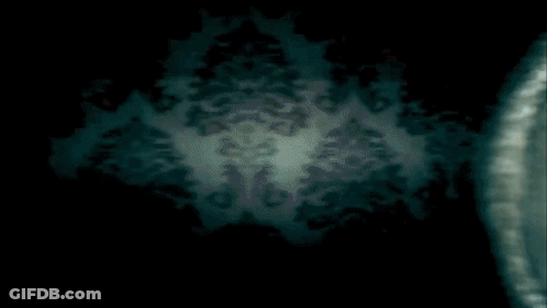 A Dark Background With A Floral Pattern And A Circle In The Middle GIF