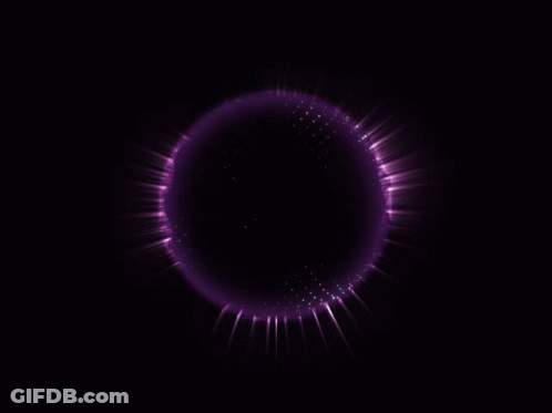 A Dark Background With A Purple Circle Of Light Coming Out Of It GIF