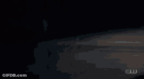 A Dark Background With The Letters Cw On The Bottom Right GIF