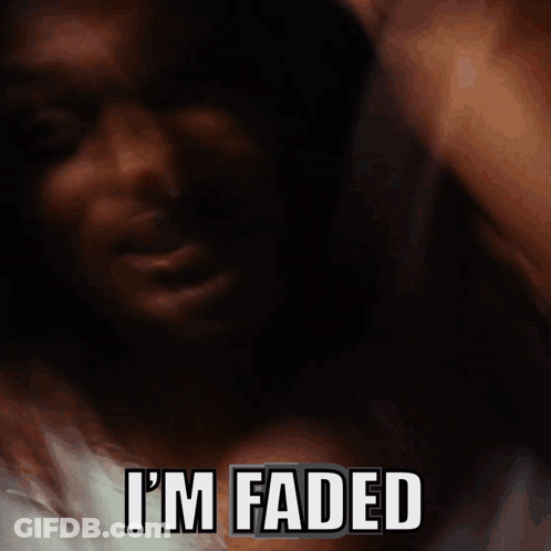 A Dark Background With The Words I 'M Faded In White Letters GIF