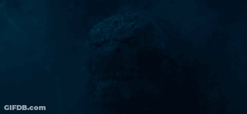 A Dark Blue Background With A Silhouette Of A Person In The Dark GIF