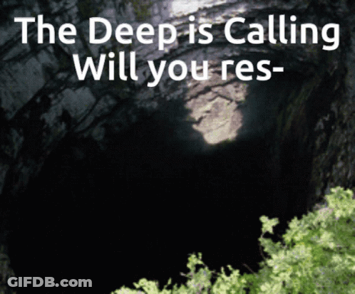 A Dark Cave With The Words " The Deep Is Calling Will You Res " GIF