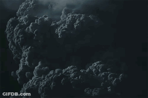 A Dark Cloudy Sky With A Lot Of Smoke Coming Out Of It . GIF