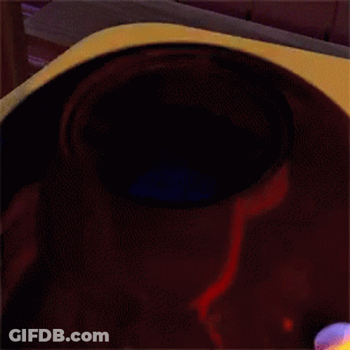 A Dark Room With A Blue Object In It GIF