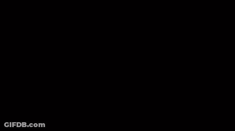 A Dark Room With A Light Coming Out Of A Window . GIF
