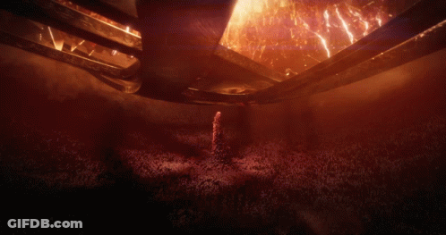 A Dark Room With A Lot Of Smoke And Flames GIF
