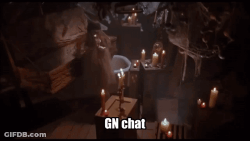 A Dark Room With Candles And The Words Gn Chat GIF
