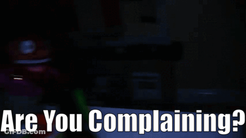 A Dark Room With The Words " Are You Complaining " On The Bottom GIF