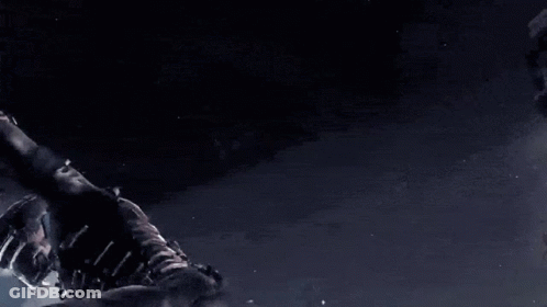 A Dark Scene With A Few Birds Flying In The Air GIF