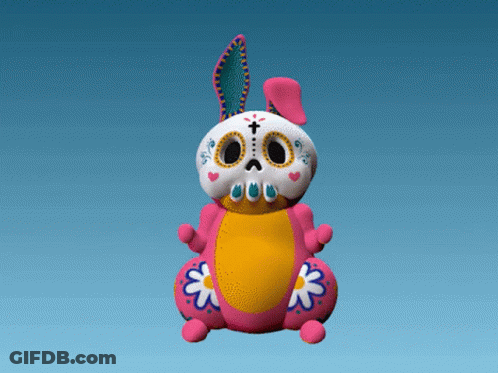 A Day Of The Dead Stuffed Animal With A Bunny Face GIF