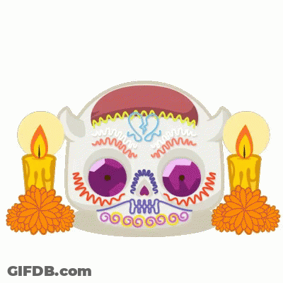A Day Of The Dead Sugar Skull With Candles And Flowers GIF