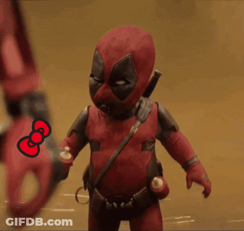 A Deadpool Doll Is Holding A Hello Kitty Bow GIF