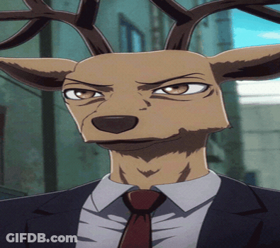 A Deer In A Suit And Tie With Antlers GIF