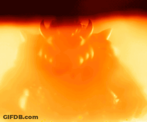A Demon With Horns Is Surrounded By Flames And Smoke GIF