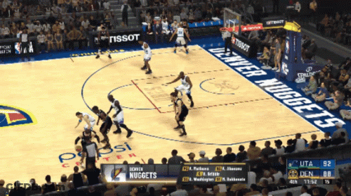 A Denver Nuggets Basketball Game Is Being Played On A Computer Screen GIF