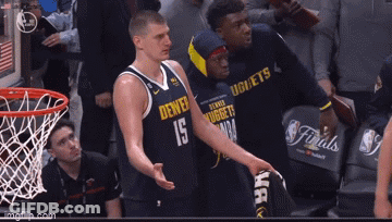 A Denver Nuggets Basketball Player Talks To Another Player GIF