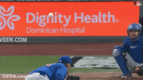 A Dignity Health Ad Is Behind A Baseball Player GIF