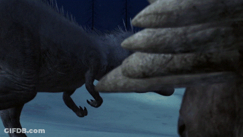 A Dinosaur With Its Mouth Open Standing Next To Another Dinosaur With Spikes GIF