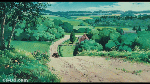 A Dirt Road Leads To A House In The Middle Of A Field GIF