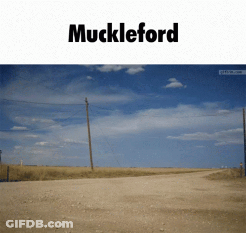 A Dirt Road With The Word Muckleford On The Top GIF