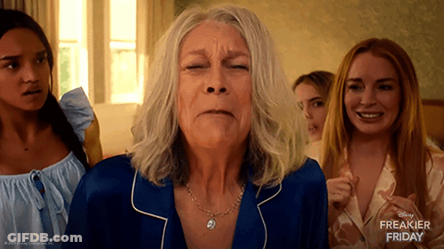 A Disney Freakier Friday Advertisement Features A Woman In A Blue Pajamas GIF