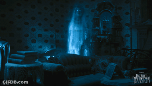 A Disney Haunted Mansion Poster With A Ghost Coming Out Of A Window GIF