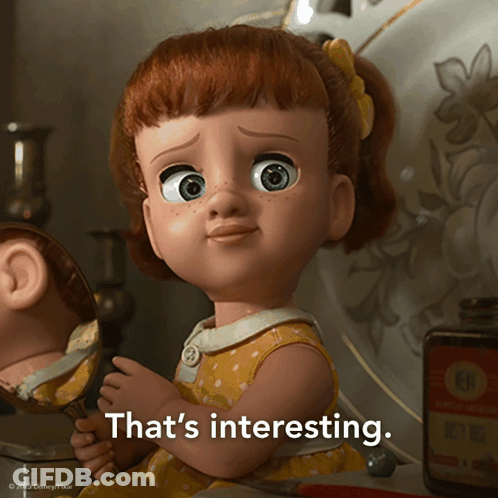 A Disney Pixar Doll Is Looking At Her Reflection In A Mirror GIF