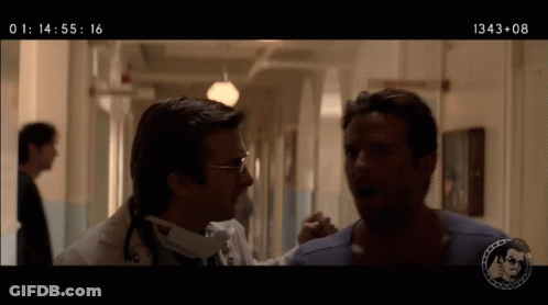 A Doctor And A Patient Are Talking In A Hallway And The Time Is 1434 08 GIF