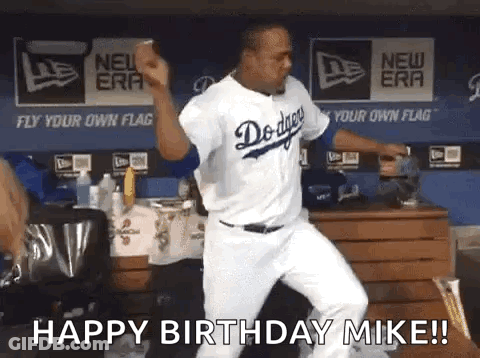 A Dodgers Baseball Player Is Dancing In The Dugout . GIF