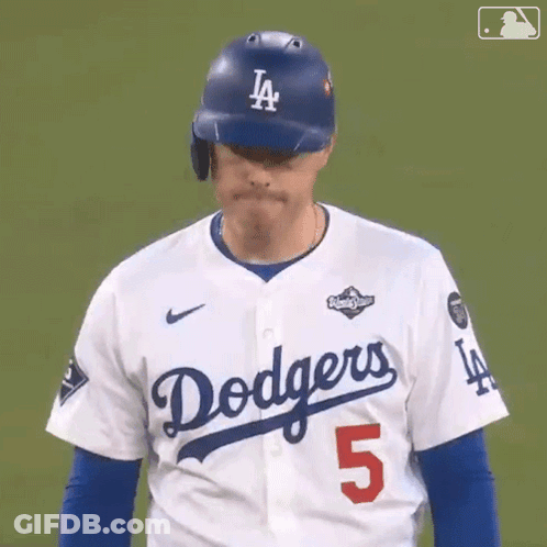 A Dodgers Baseball Player Wearing A White Jersey With The Number 5 GIF