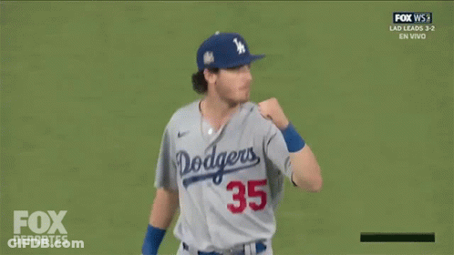 A Dodgers Baseball Player Wearing Number 35 Celebrates A Win GIF