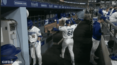 A Dodgers Player With The Number 68 On The Back Of His Shirt GIF