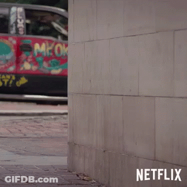 Dog Peeking Out From Behind Wall Netflix GIF