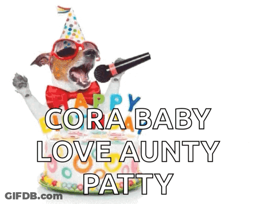 A Dog Singing Into A Microphone With The Words Cora Baby Love Aunty Patty GIF
