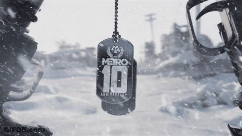 A Dog Tag That Says Metro 10 Anniversary On It GIF