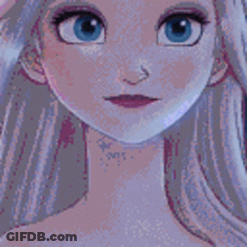 A Doll In A White Dress Is Standing On A Stage GIF