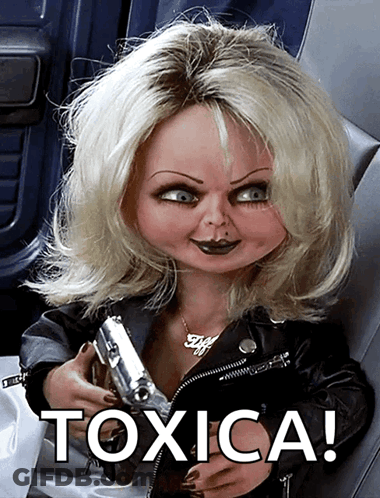 A Doll Is Holding A Gun And The Words Toxica Are Below Her GIF