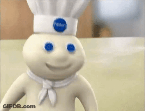 A Doll With Blue Eyes And A Chef 'S Hat GIF