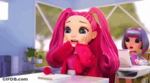 A Doll With Pink Hair Is Sitting At A Desk In A Classroom . GIF