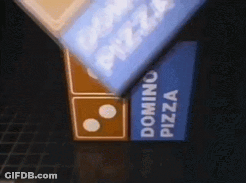 A Domino 'S Pizza Sign Is Lit Up At Night GIF