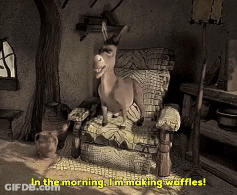 A Donkey Sitting In A Chair With The Words In The Morning I 'M Making Waffles Below It GIF