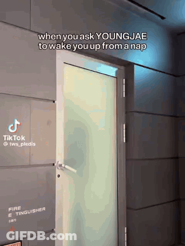 A Door With A Sign That Says Fire Extinguisher GIF