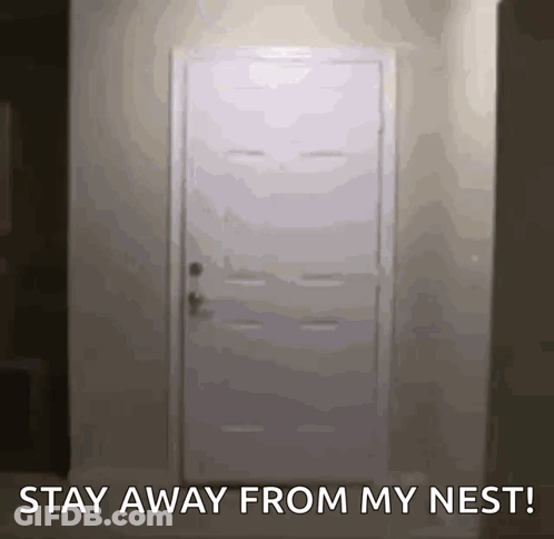 A Door With The Words " Stay Away From My Nest " Written On It GIF