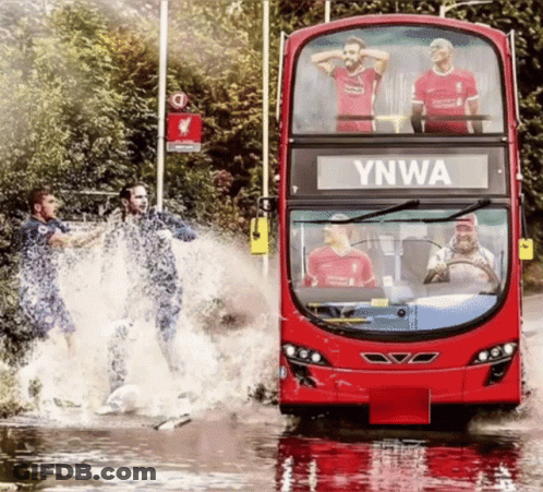 A Double Decker Bus That Says Ynwa On It GIF