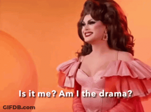 A Drag Queen In A Pink Dress Is Asking Is It Me Am I The Drama . GIF